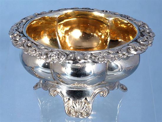 A set of four George III provincial silver table salts with matching mustard, Diameter 3 ¾”/94mm combined weight 21.5oz/609grm
